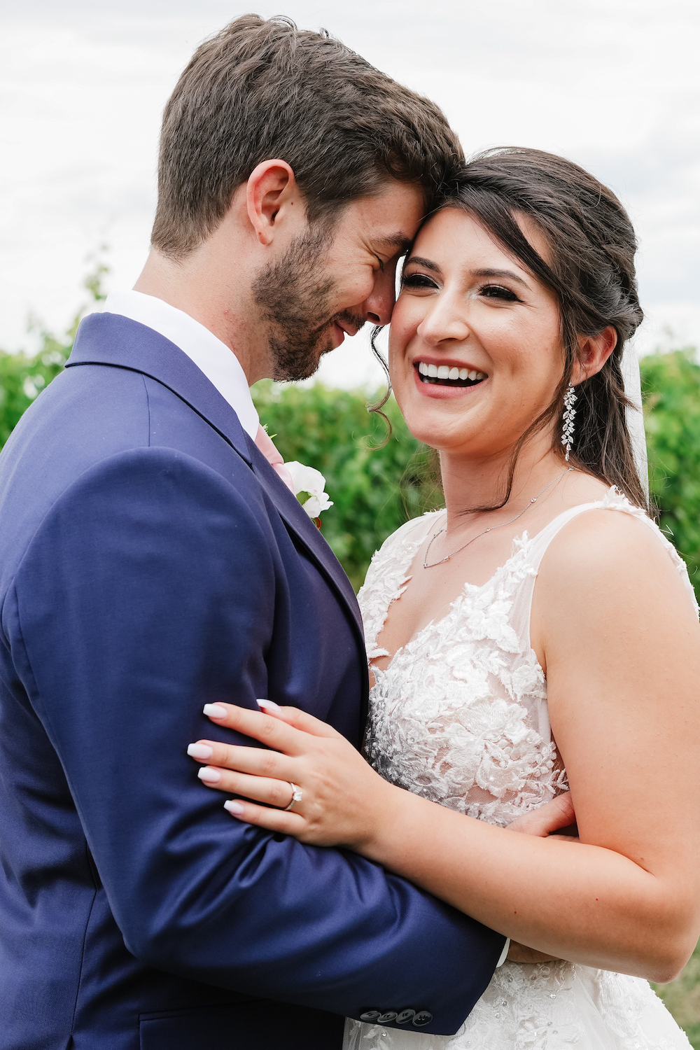 bride and groom in vineyard